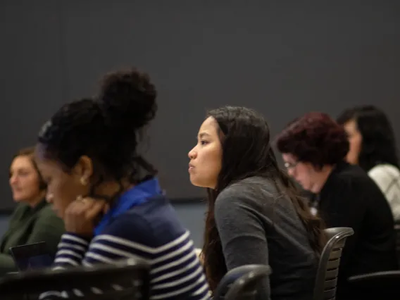 audience listens in a breakout session