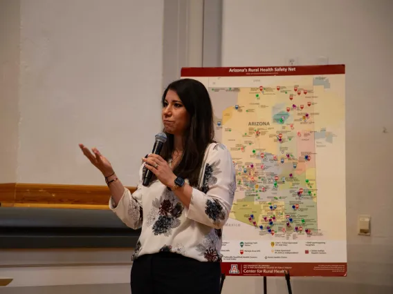 Carmen Heredia in front of map of Arizona