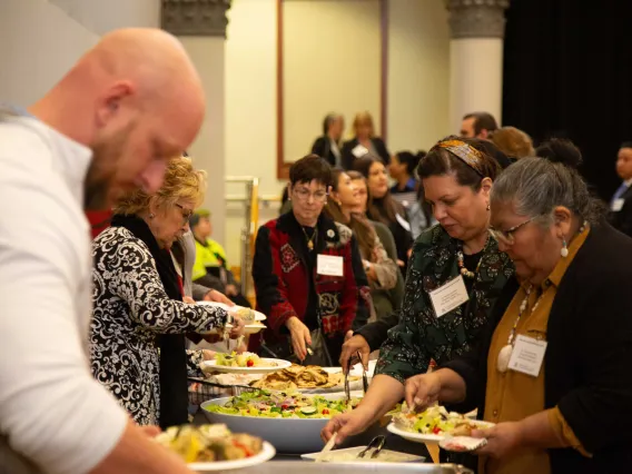 people gathered at the lunch buffet