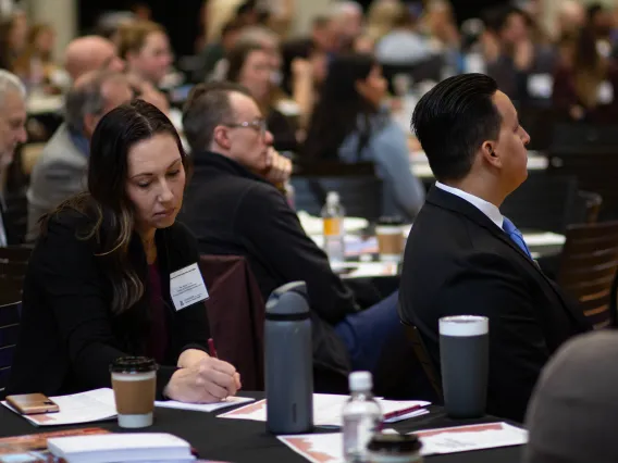 Megan Trosko listens during a general session