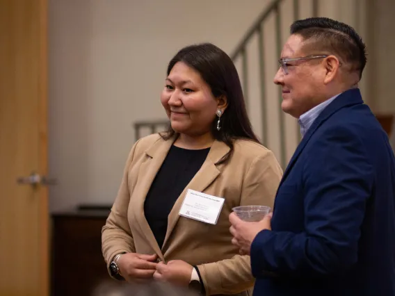 Sheryl Nelson and Dominic Chlichee listening