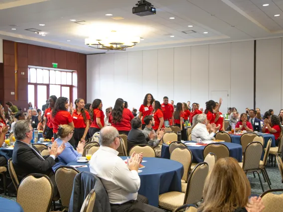 Nursing students standing at the conference