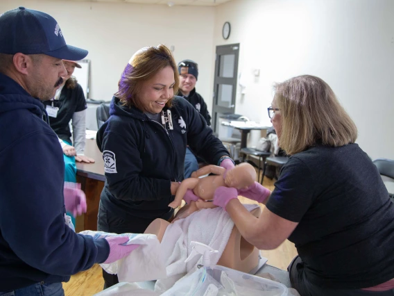 A White Mountain Ambulance Services Paramedic practicing skills