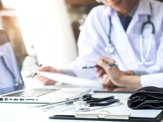 doctor with bills