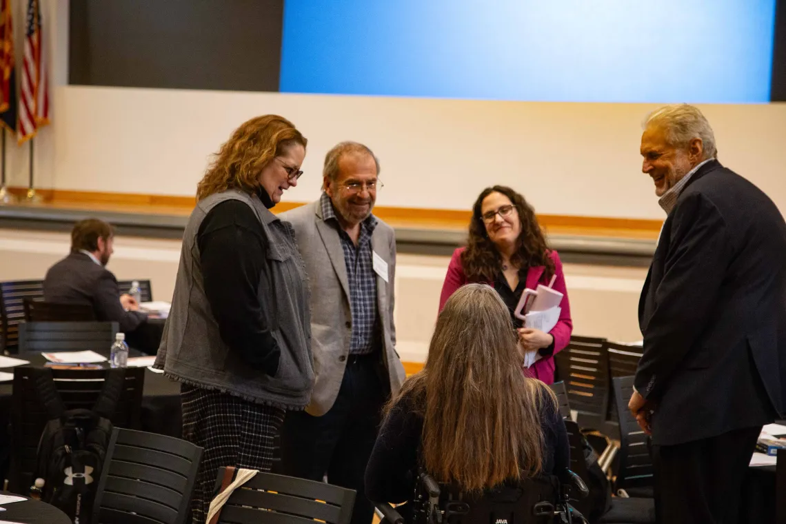 a small group of people in discussion