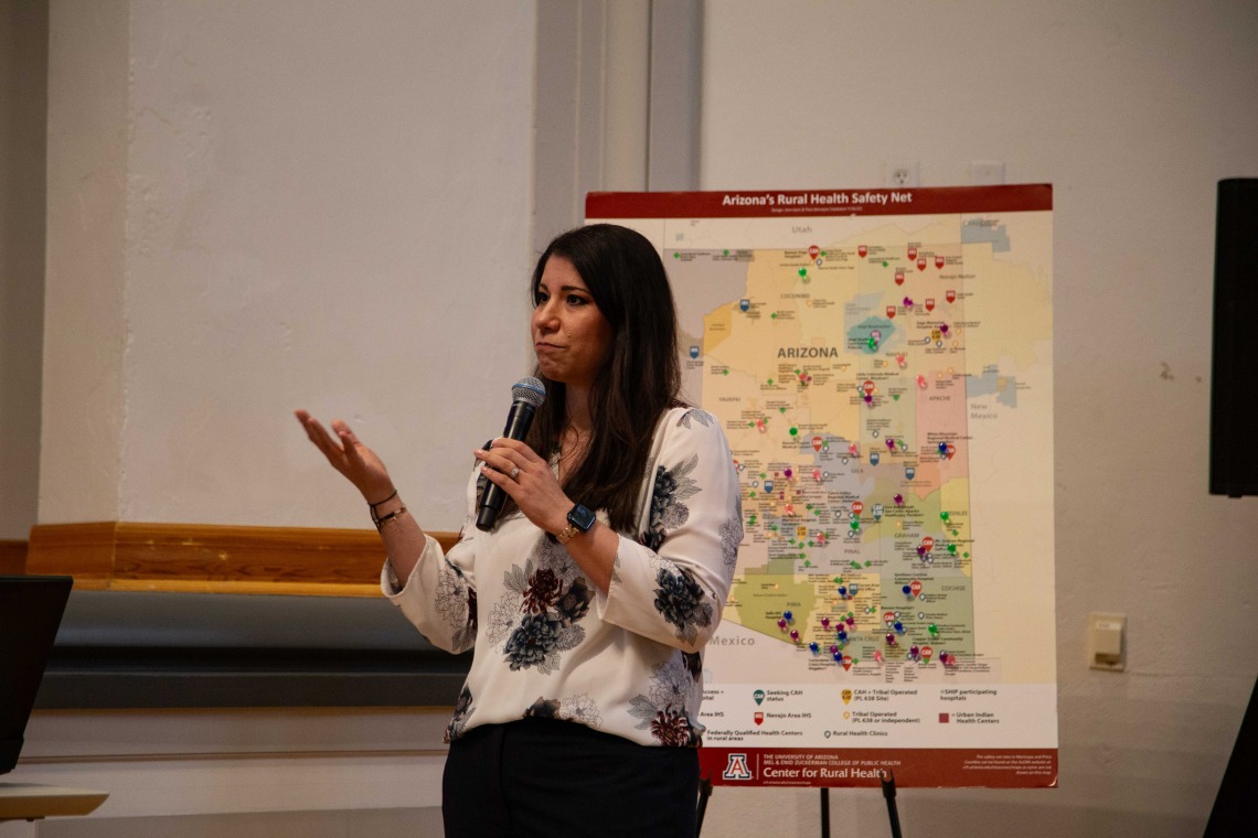 Carmen Heredia in front of map of Arizona