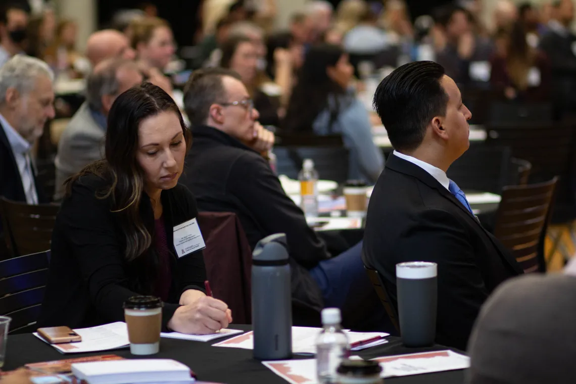 Megan Trosko listens during a general session