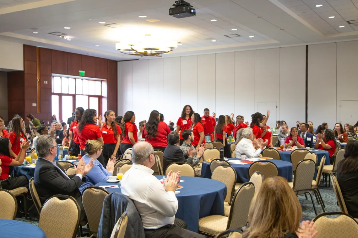 Nursing students standing at the conference