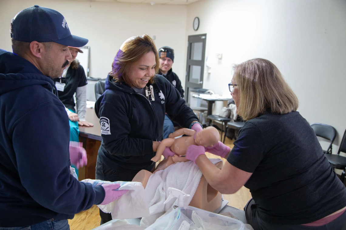 A White Mountain Ambulance Services Paramedic practicing skills