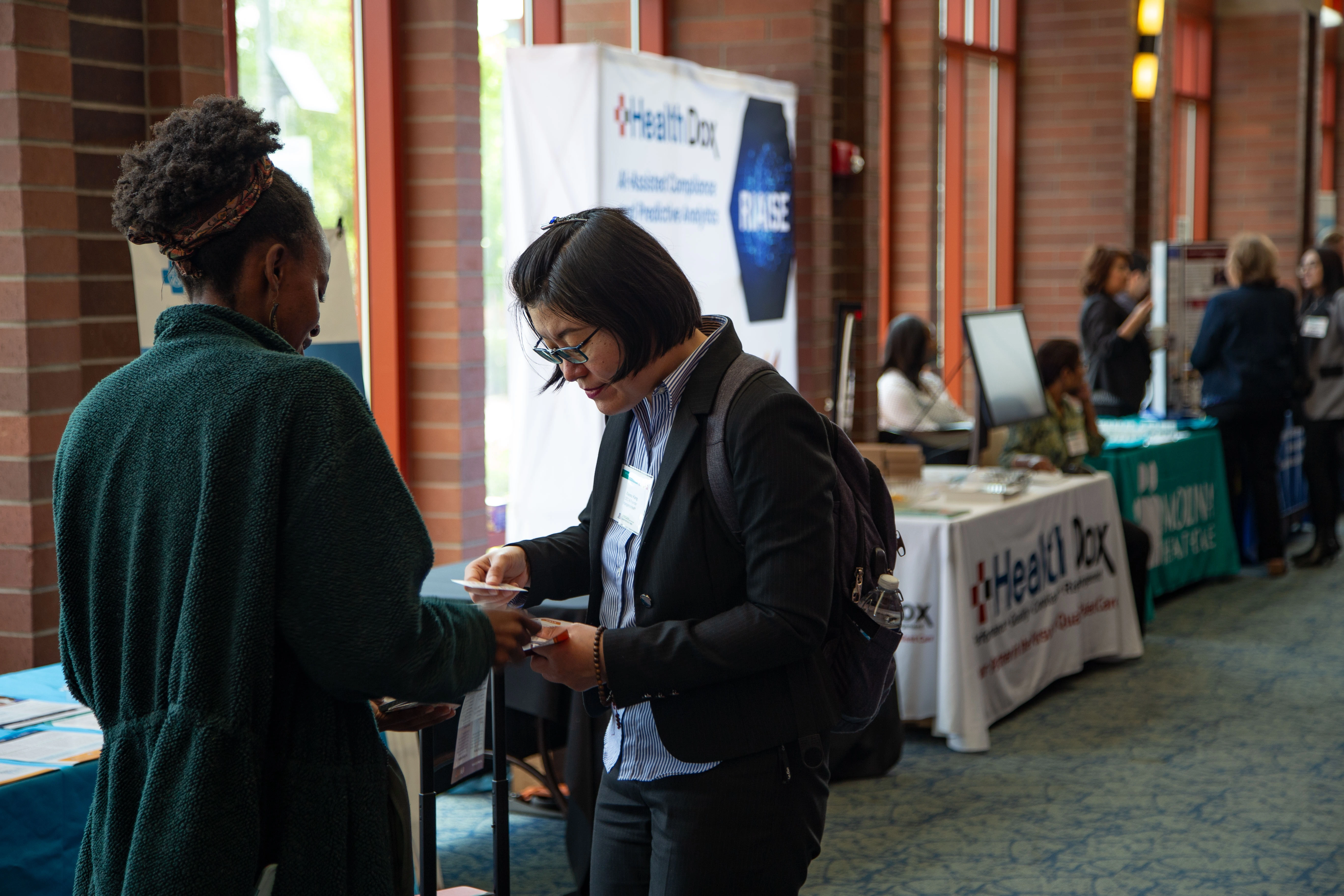 Virginia Wanjiru talks with Dr.Xiaoxu Kang