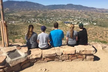 family overlooking Globe