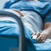 patient in hospital bed